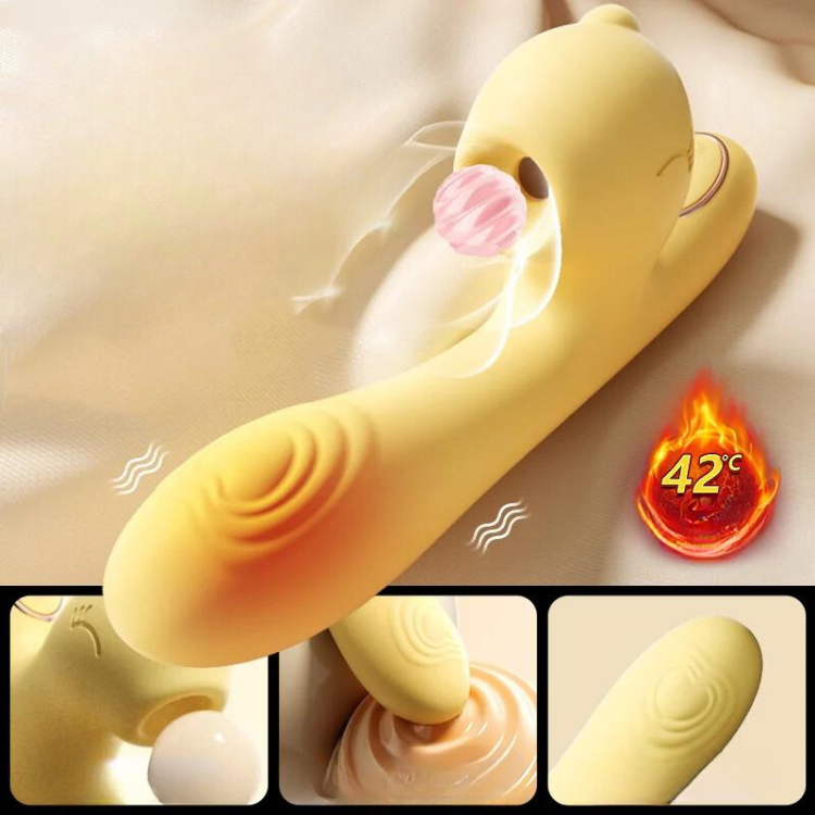 Yellow clitoral suction vibrator shown at an angle with a ridged handle and 42°C warming graphic