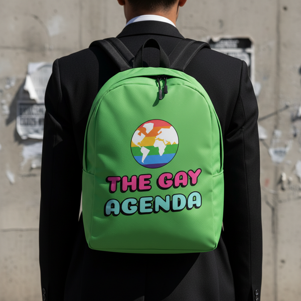 Bright green backpack reading “THE GAY AGENDA,” worn on a person in a black suit