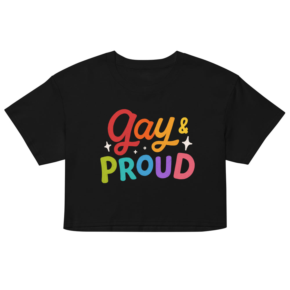 Gay & Proud Crop Top worn by a confident young man in a rainbow-flagged, graffiti-bright street lit with neon and LGBTQ+ posters.