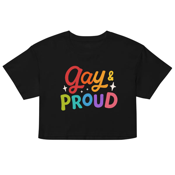 Gay & Proud Crop Top worn by a confident young man in a rainbow-flagged, graffiti-bright street lit with neon and LGBTQ+ posters.