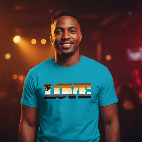 Smiling person wearing a teal T-shirt with a bear-themed pride flag LOVE graphic