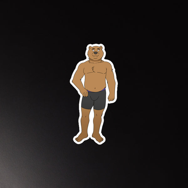 Front-facing cartoon brown bear magnet wearing dark boxer briefs on a black background