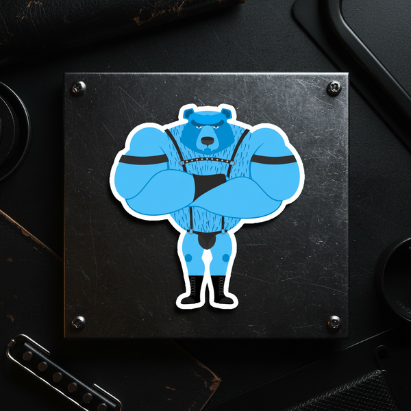 Cartoon blue muscular bear with black straps and crossed arms, stern face on scratched black metal magnet