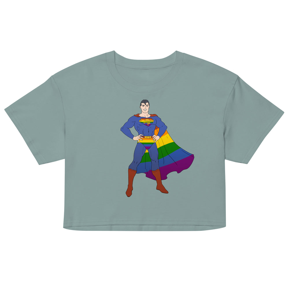 Front view of a sage green T-shirt with a cartoon superhero in a rainbow cape