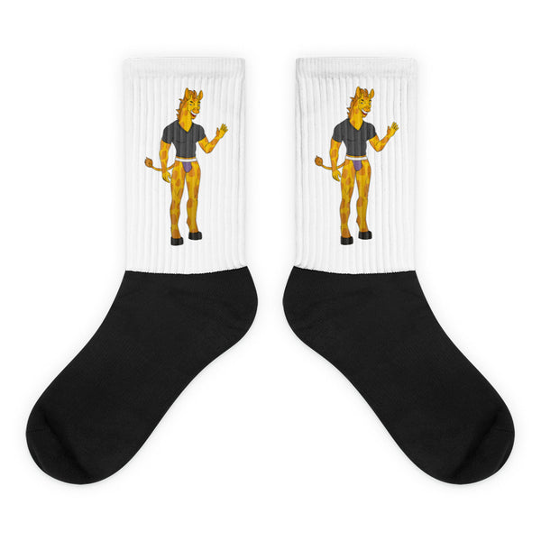 Pair of white-ribbed socks with cartoon giraffes and black feet