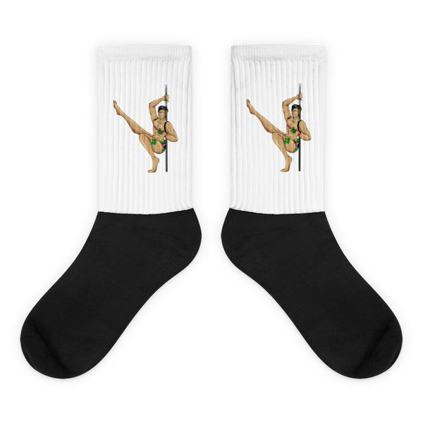 Pair of crew socks with black feet and white ribbed cuffs showing a pole dancer in a green floral outfit