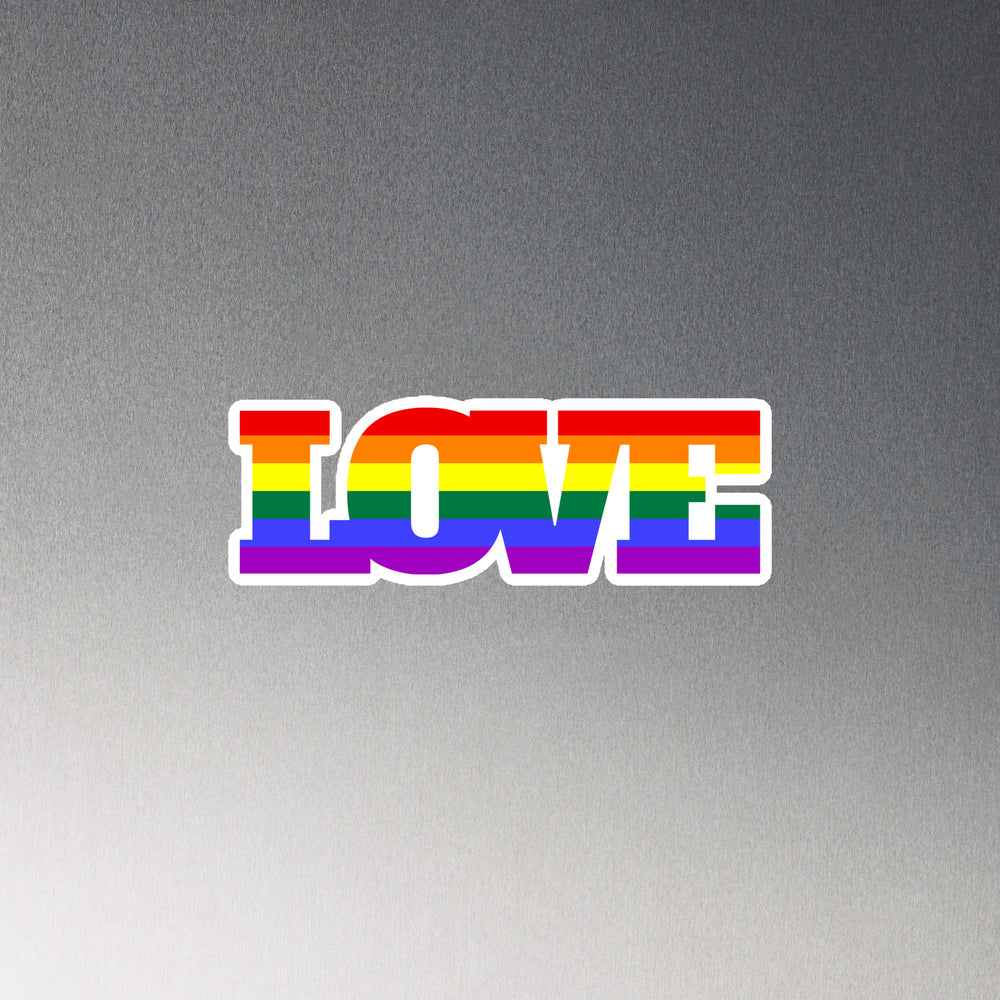Rainbow-striped LOVE magnet on a gray background
