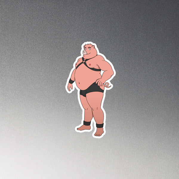 Cartoon pig magnet shown at an angle, wearing a black harness, briefs, wristbands, and ankle cuffs