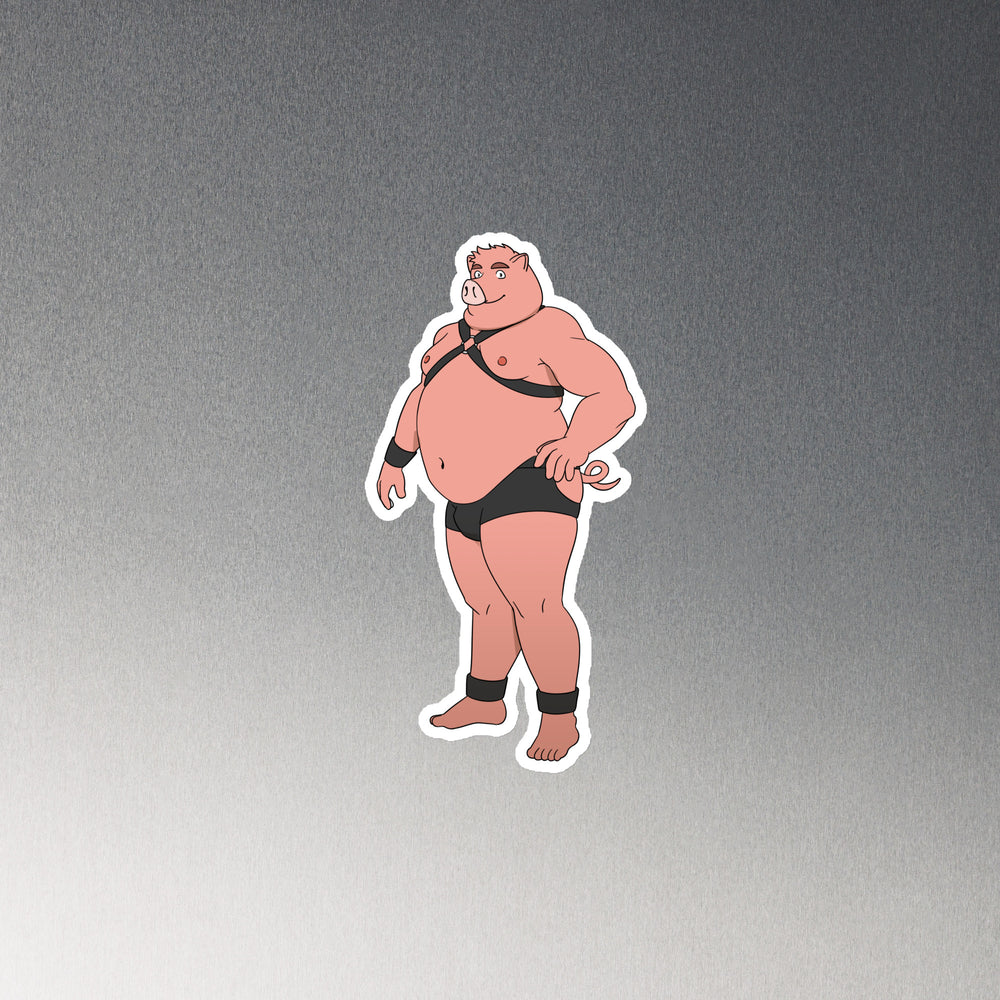 Cartoon pig magnet shown at an angle, wearing a black harness, briefs, wristbands, and ankle cuffs
