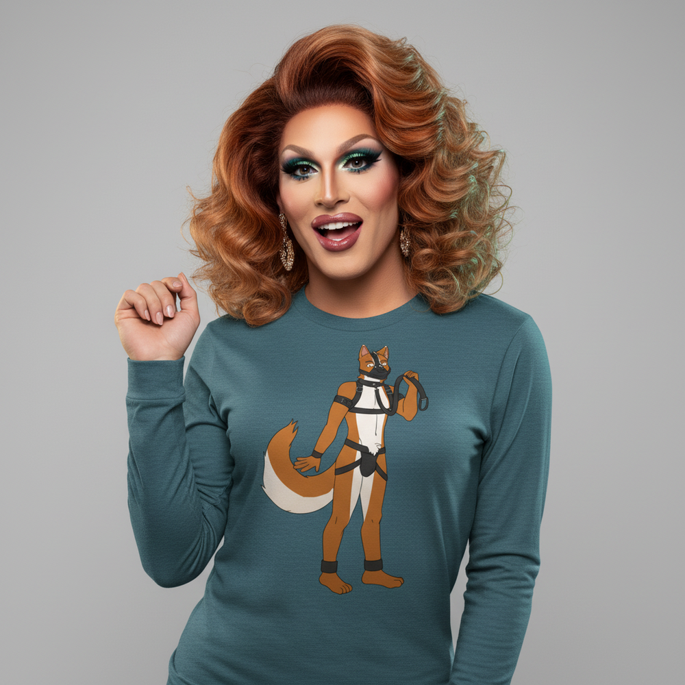Gay Pup Unisex Long Sleeve T-Shirt in teal, with a cartoon fox in a harness. Model with bold red hair, makeup, earrings