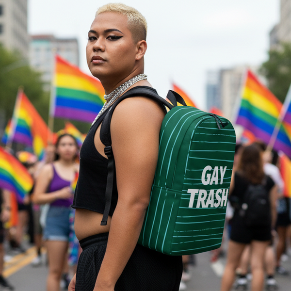 Gay Trash Minimalist Backpack at a Pride parade, with rainbow flags