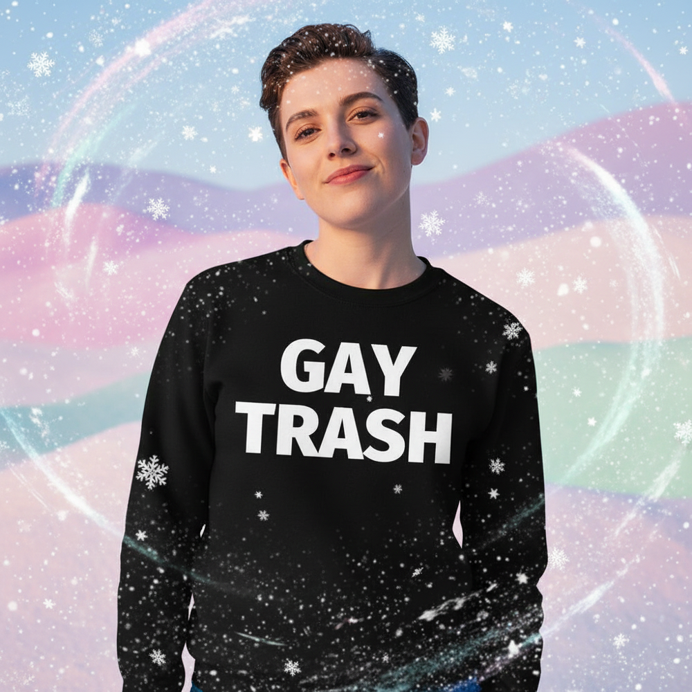 Person wearing Gay Trash Unisex Sweatshirt in black, featuring bold white lettering, set against a pastel snowy backdrop