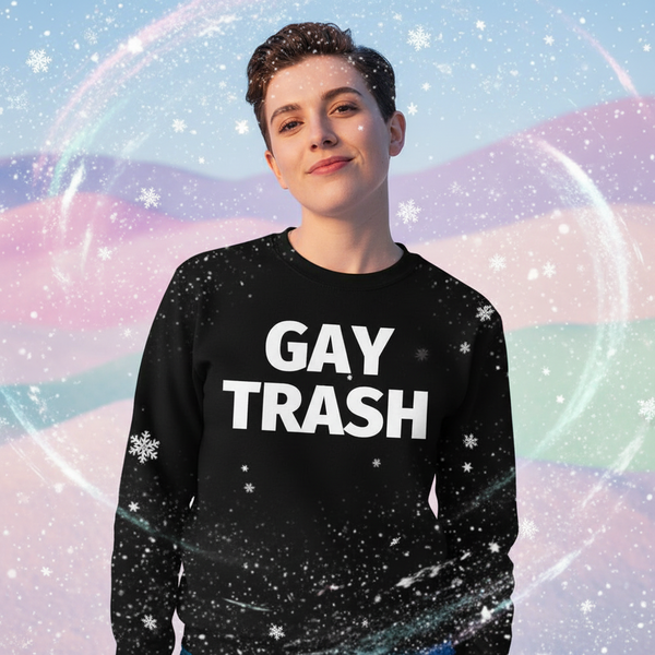 Person wearing Gay Trash Unisex Sweatshirt in black, featuring bold white lettering, set against a pastel snowy backdrop