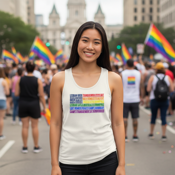 Gay USA Unisex Tank Top with bold, colorful LGBTQ+ identities text; rainbow flags wave at a pride parade in the city.