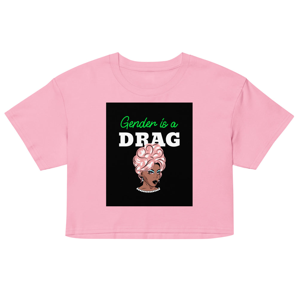 Pink crop top with black graphic reading “Gender is a DRAG” and a glam drag portrait