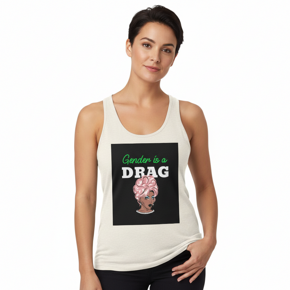 Unisex tank top with bold drag queen art and "Gender is a DRAG." Queer femme model, relaxed, smiles with hand in pocket.