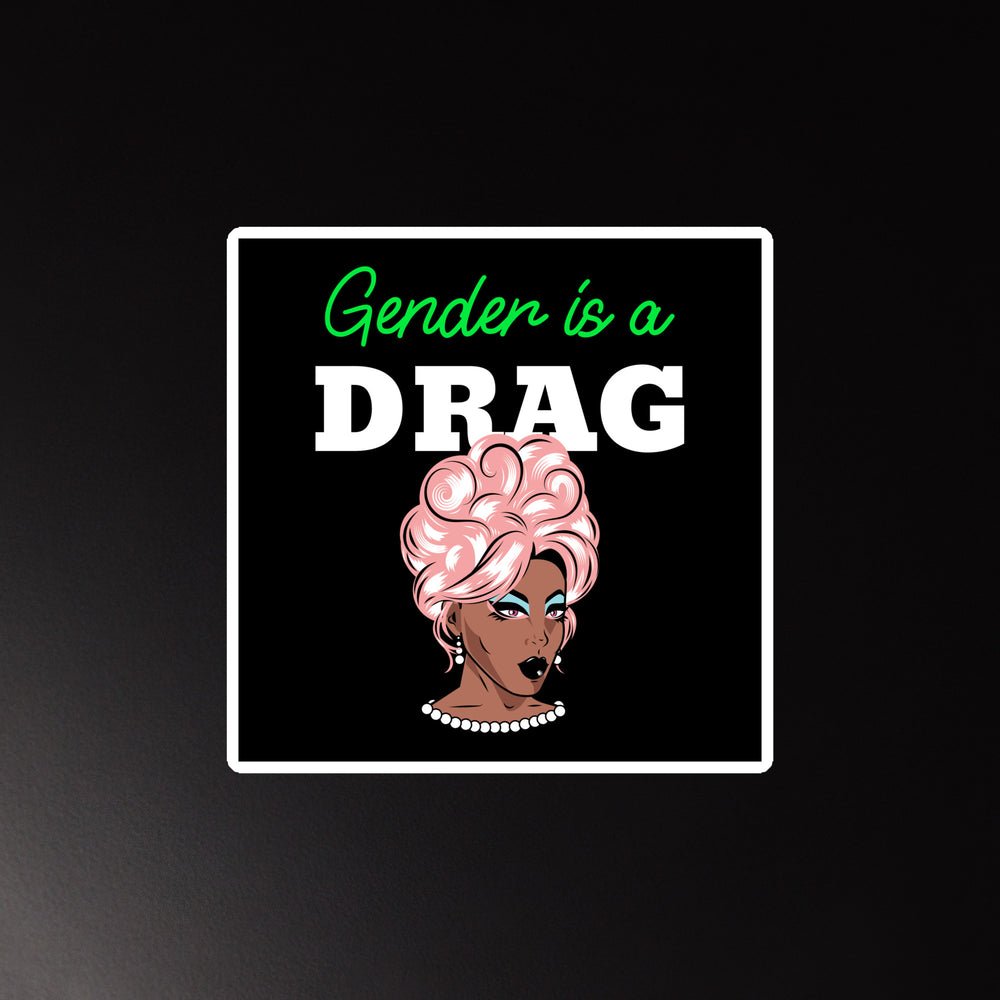 Square magnet reading “Gender is a DRAG,” with a pink-haired drag performer illustration