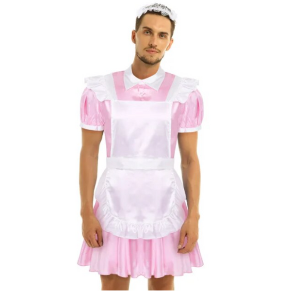 Front-facing model wearing a pink-and-white maid dress with apron and lace headband