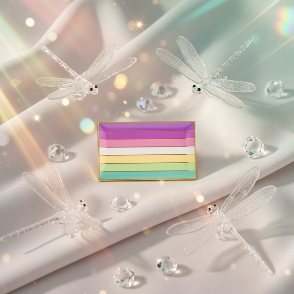 Genderfae pride flag enamel pin on satin, surrounded by dragonflies and crystals