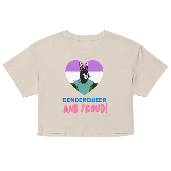 Front view of a beige crop top reading “GENDERQUEER AND PROUD!” with a bunny in a pride-colored heart