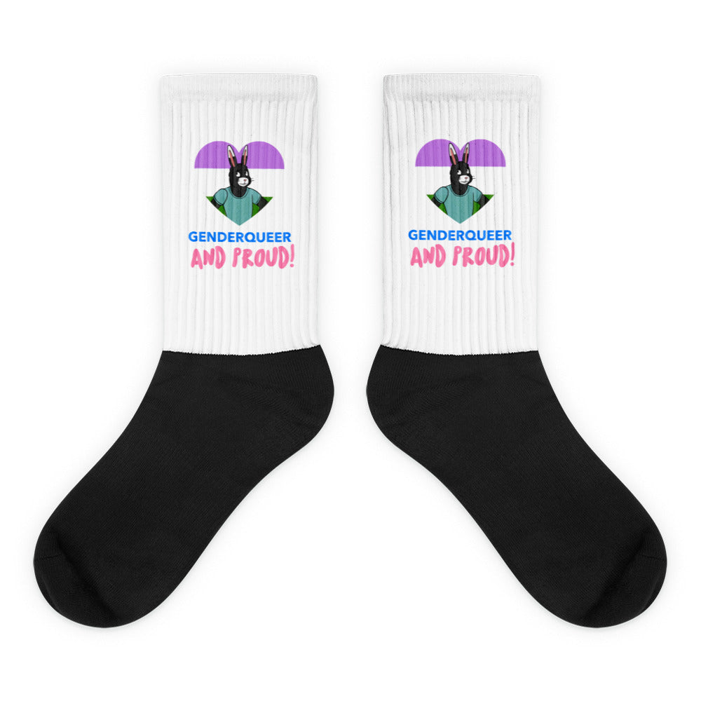 Pair of black-and-white socks with a genderqueer rabbit graphic and “GENDERQUEER AND PROUD!” text