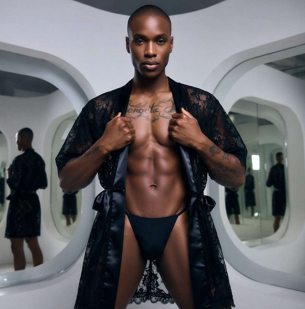 A confident, muscular person models the Genderqueer Transparent Lace Bathrobe & Thong Set