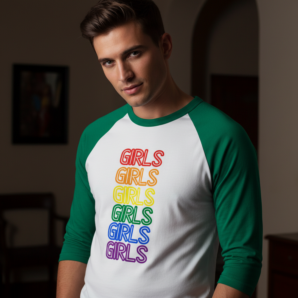 Girls Girls Girls 3/4 sleeve raglan shirt, white with green sleeves, “GIRLS” six times in rainbow colors; person indoors