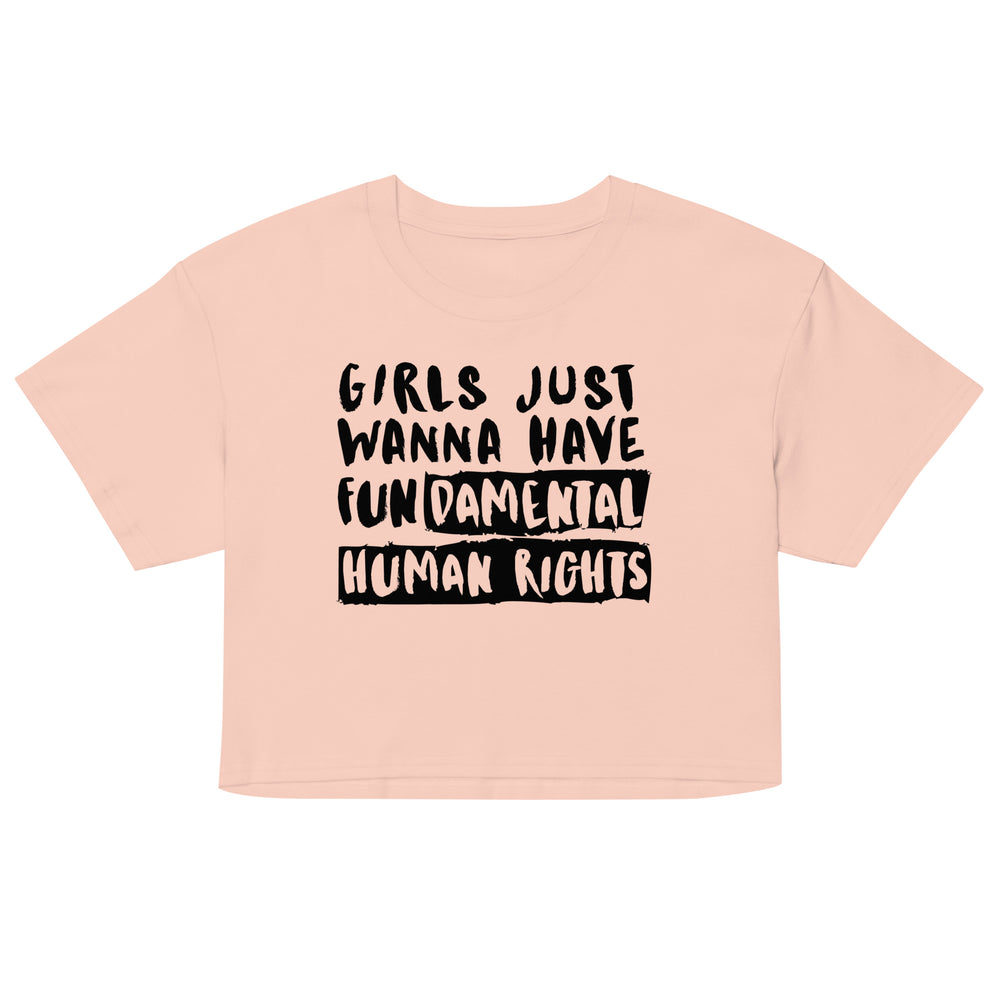 Front view of a pale pink crop top reading “Girls Just Wanna Have Fundamental Human Rights.”