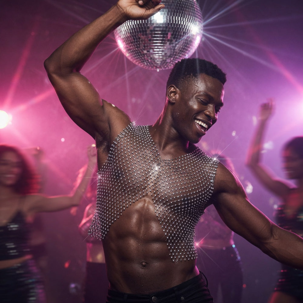 Dancer wearing a sparkling rhinestone fishnet vest with an exposed midriff under a disco ball
