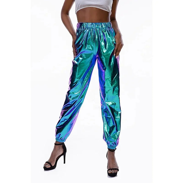 Front view of a model wearing iridescent teal and purple high-waist jogger pants