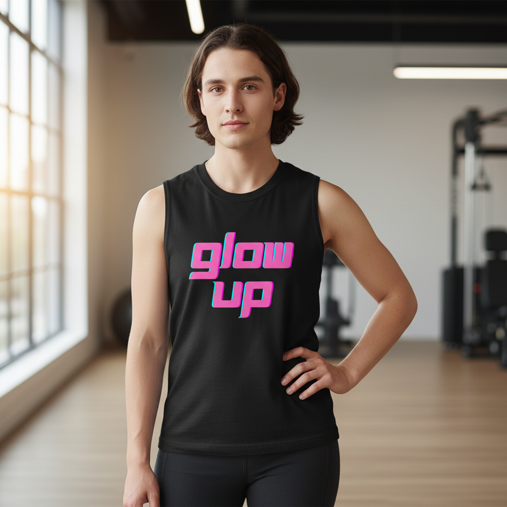 Glow Up Muscle Top with "glow up" in bold pink lettering, worn by a person in a sunlit gym with large windows and equipment