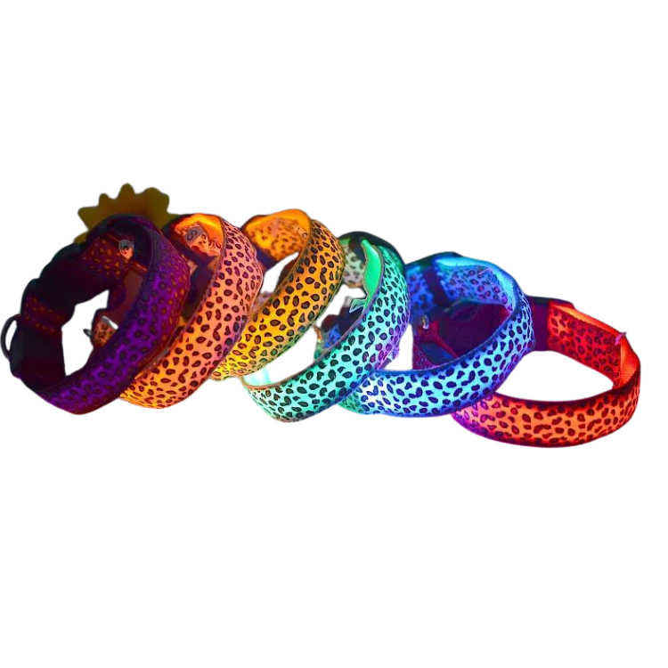 Several colorful leopard-print arm straps overlapping in a row on white