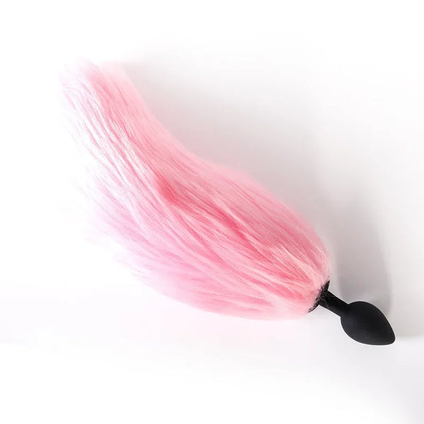 Pink furry tail butt plug with a black tapered base, shown on a white background
