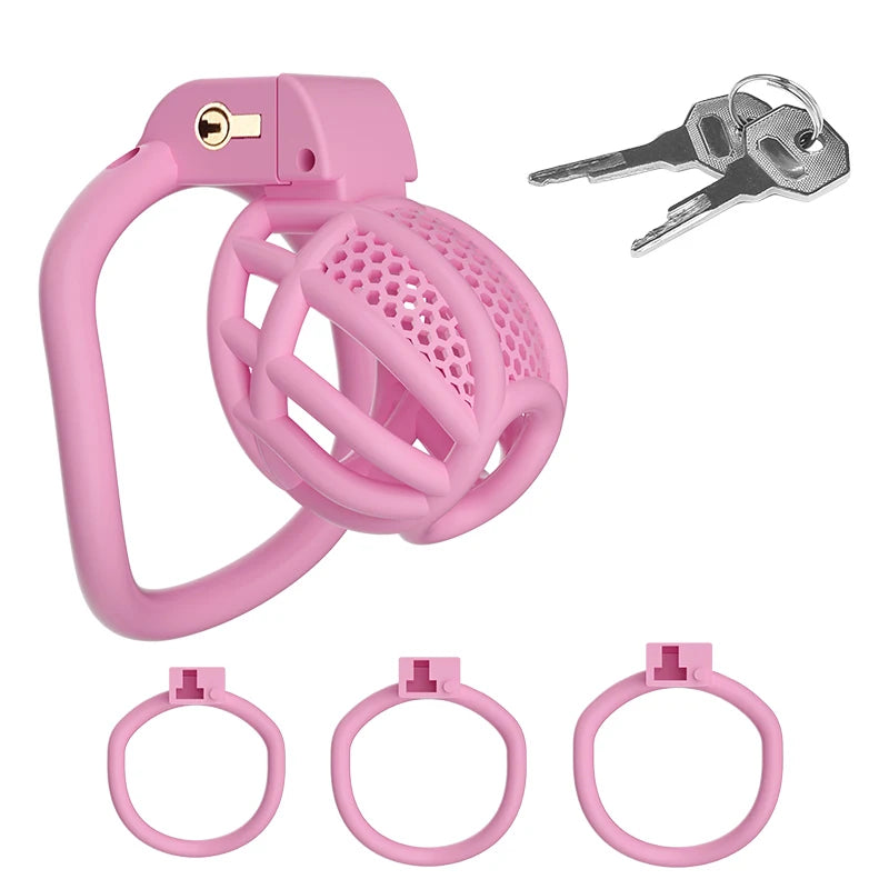 Pink male chastity cage with lock, two keys, and three interchangeable rings