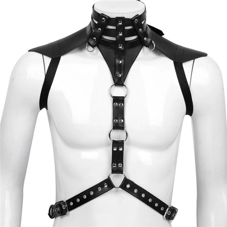 Front view of a black leather chest harness on a white mannequin with O-rings and buckles