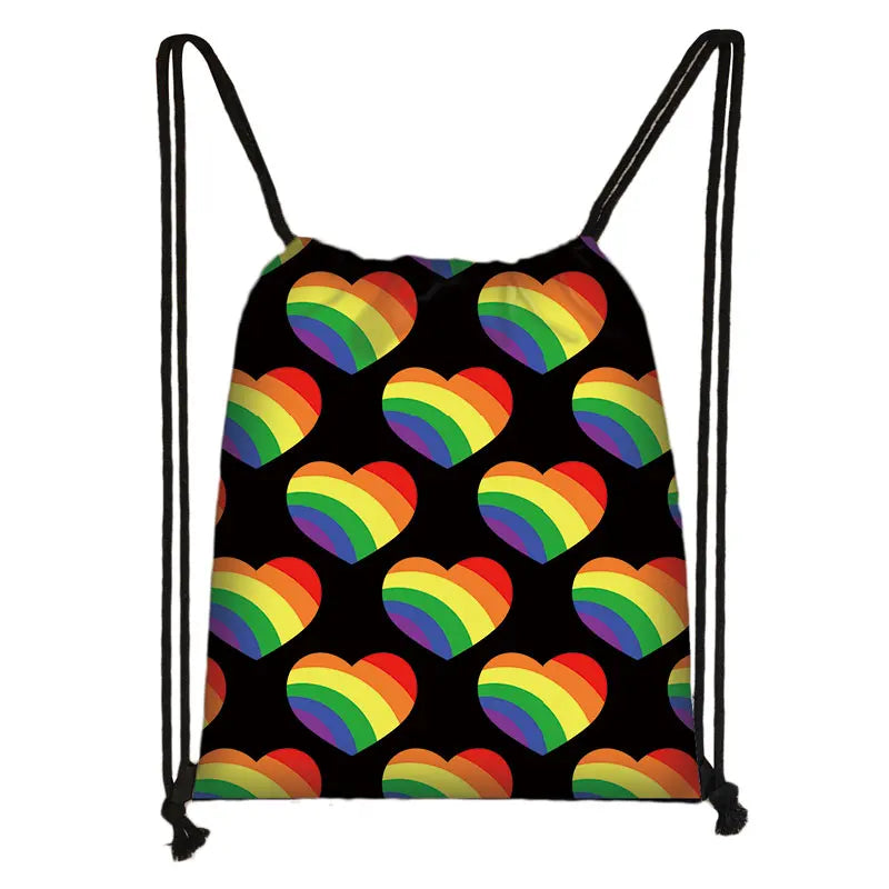 Black drawstring bag patterned with repeating rainbow-colored hearts
