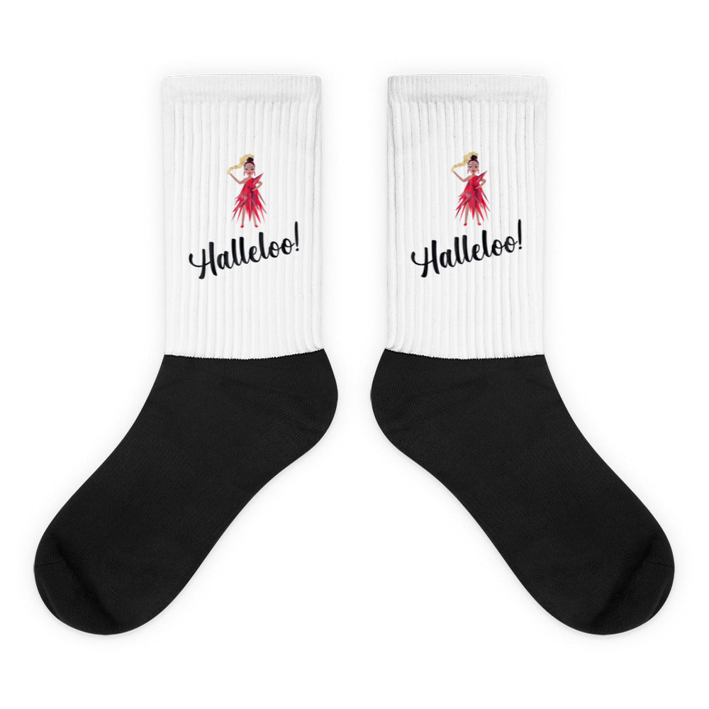 Pair of black-and-white socks with red performer graphics and “Halleloo!” text