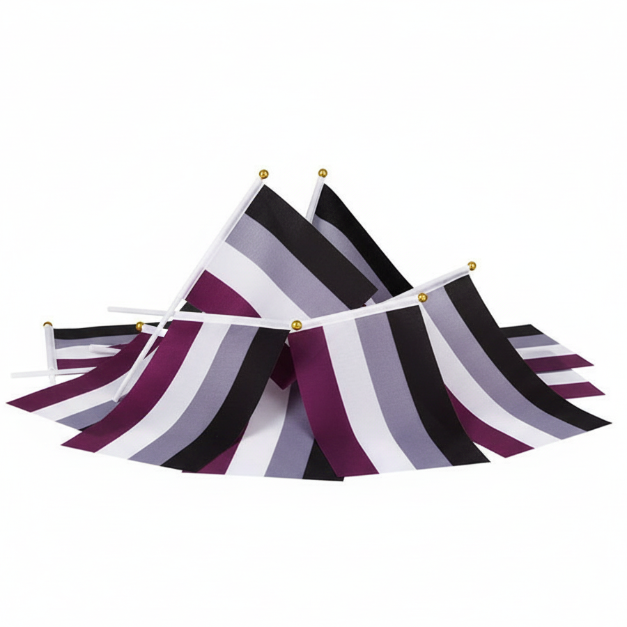Pile of handheld asexual pride flags with black, gray, white, and purple stripes