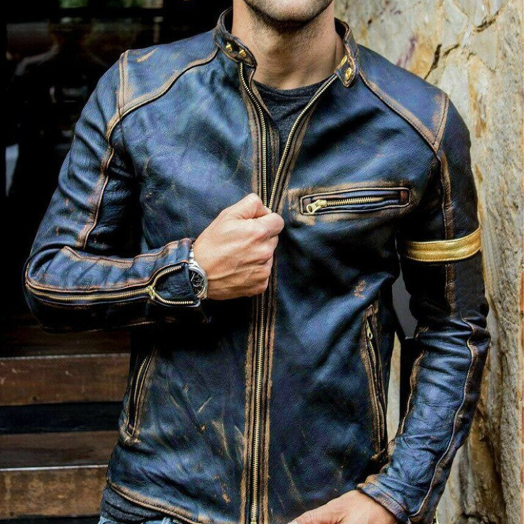 Cropped model wearing a distressed blue leather biker jacket with multiple zippers