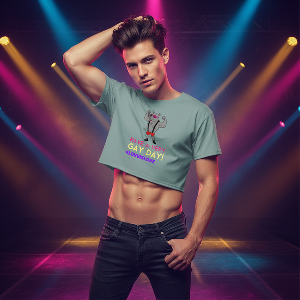 Have A Very Gay Day! crop top with cartoon art and #LoveIsLove slogan, worn by a young man on a vibrant, spotlight stage.