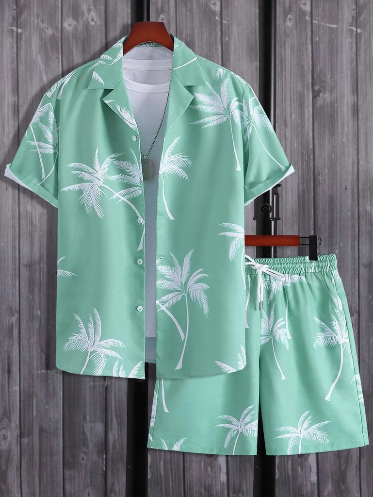 Mint green Hawaiian shirt and shorts set with white palm-tree print, displayed on a clothing rack