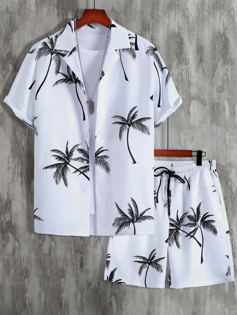White two-piece shirt and shorts set with black palm tree print, displayed on hangers