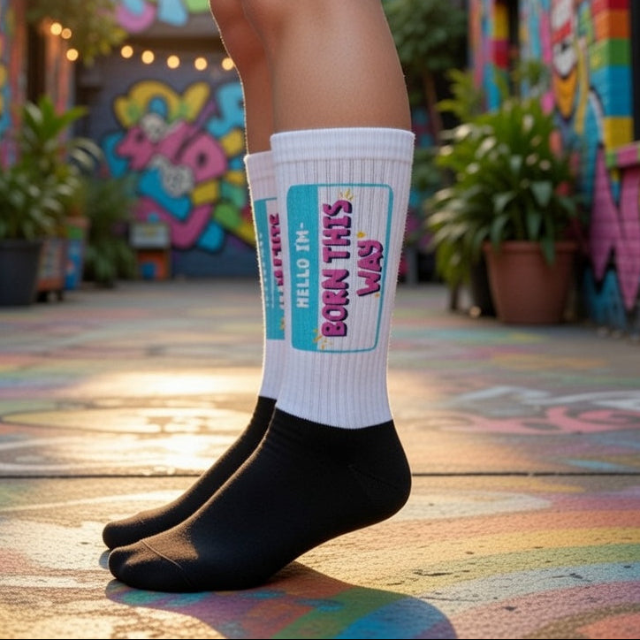 Hello I'm Born This Way socks, bold and colorful, styled with black shoes