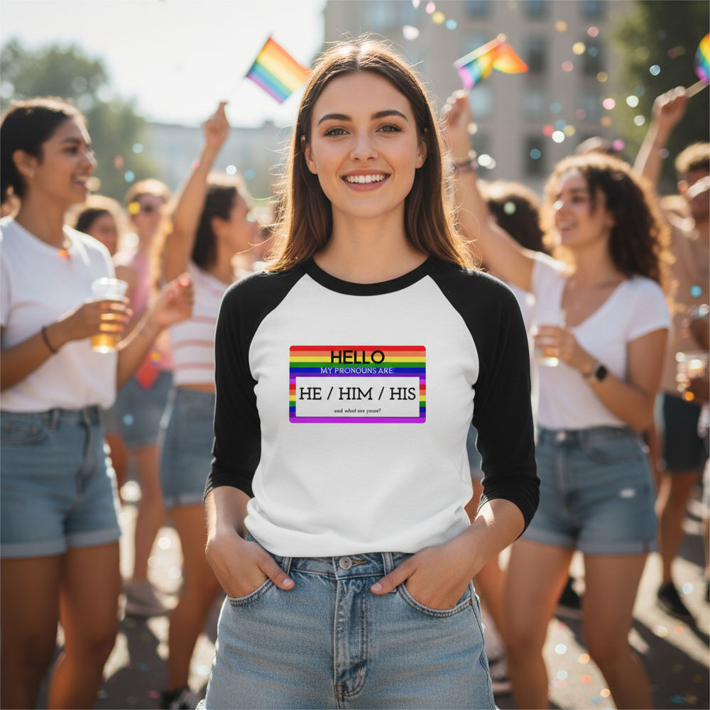 Hello My Pronouns Are they / them / their 3/4 sleeve raglan shirt on a happy person at Pride, with pride flags and confetti