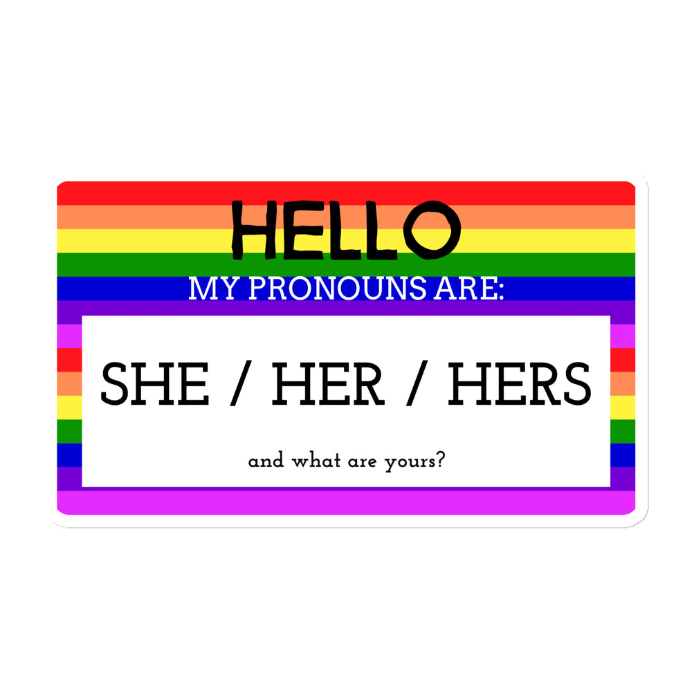 Magnet with a rainbow and purple border, reading “Hello My Pronouns Are She / Her / Hers”—queer, gender-affirming
