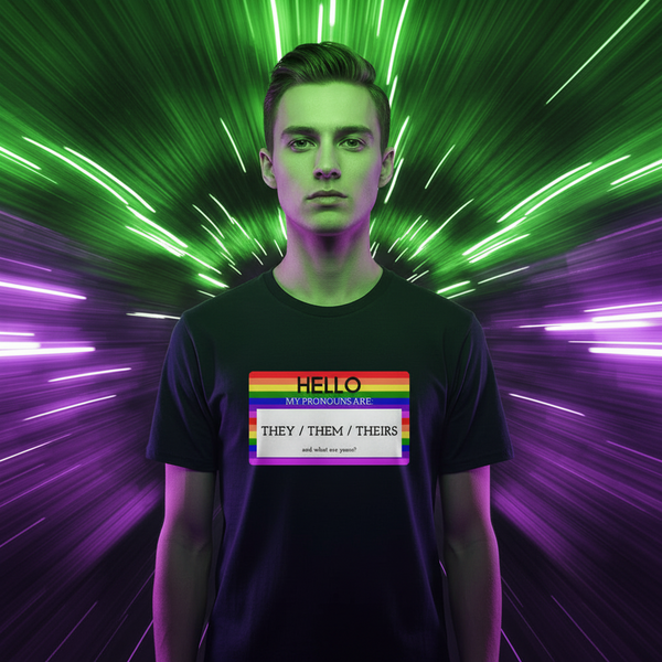 Hello My Pronouns Are They / Them / Theirs T-shirt with a rainbow-striped name tag, person standing proudly