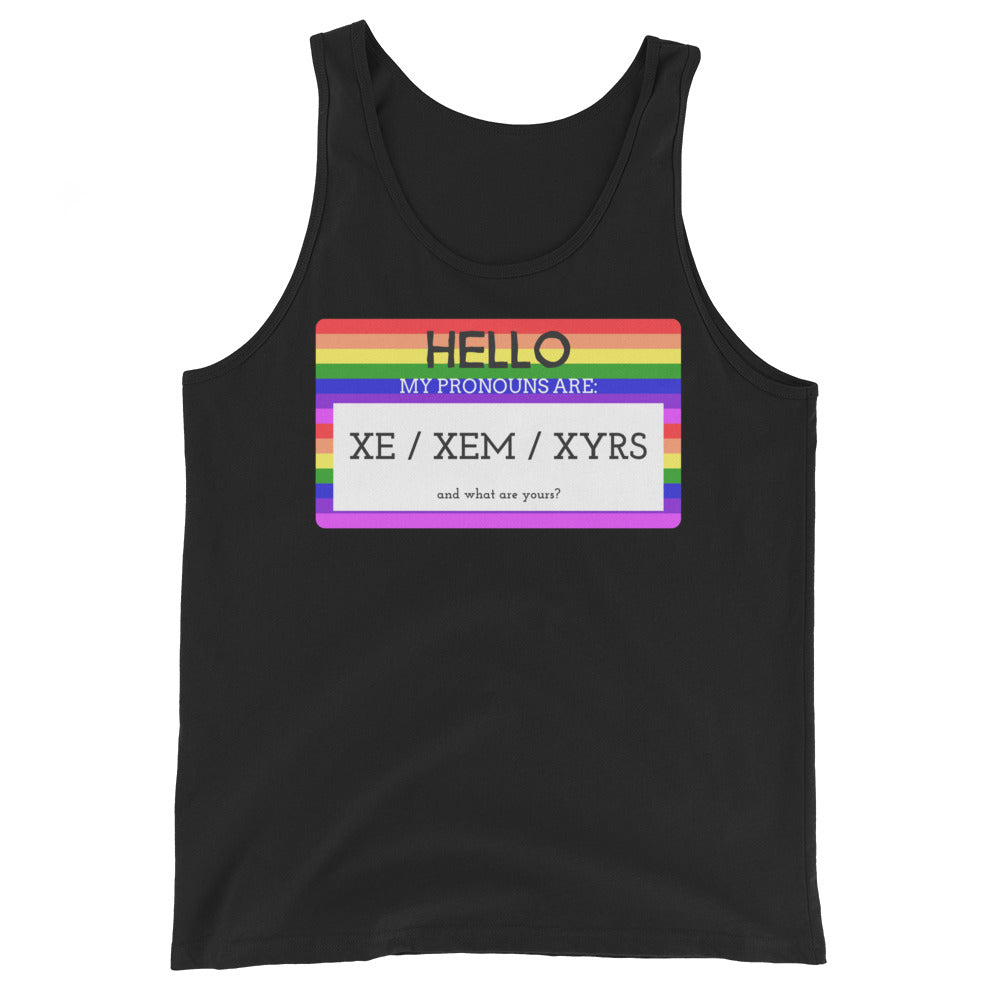 Unisex black tank top with a rainbow-striped name tag graphic: "HELLO MY PRONOUNS ARE: XE / XEM / XYRS and what are yours?"