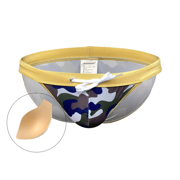 Front view of a camouflage swim brief with yellow trim, white drawstring, and tan cup insert