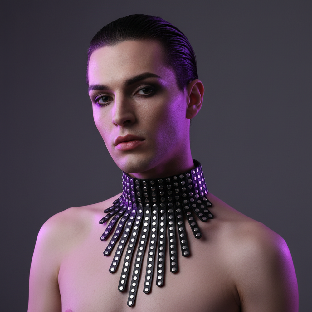 Model wearing a black studded leather choker with long hanging straps