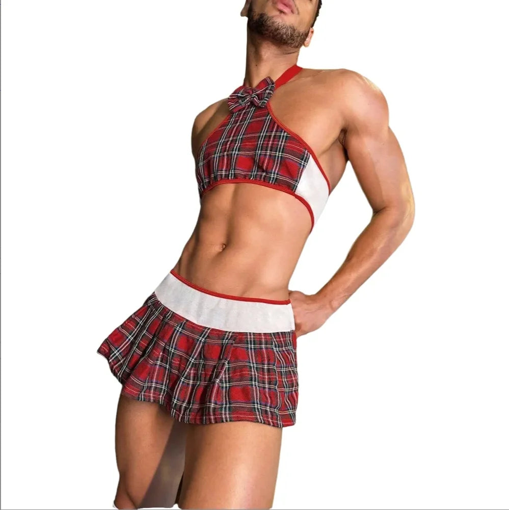 Cropped model wearing a red tartan halter crop top with bow tie and pleated mini skirt